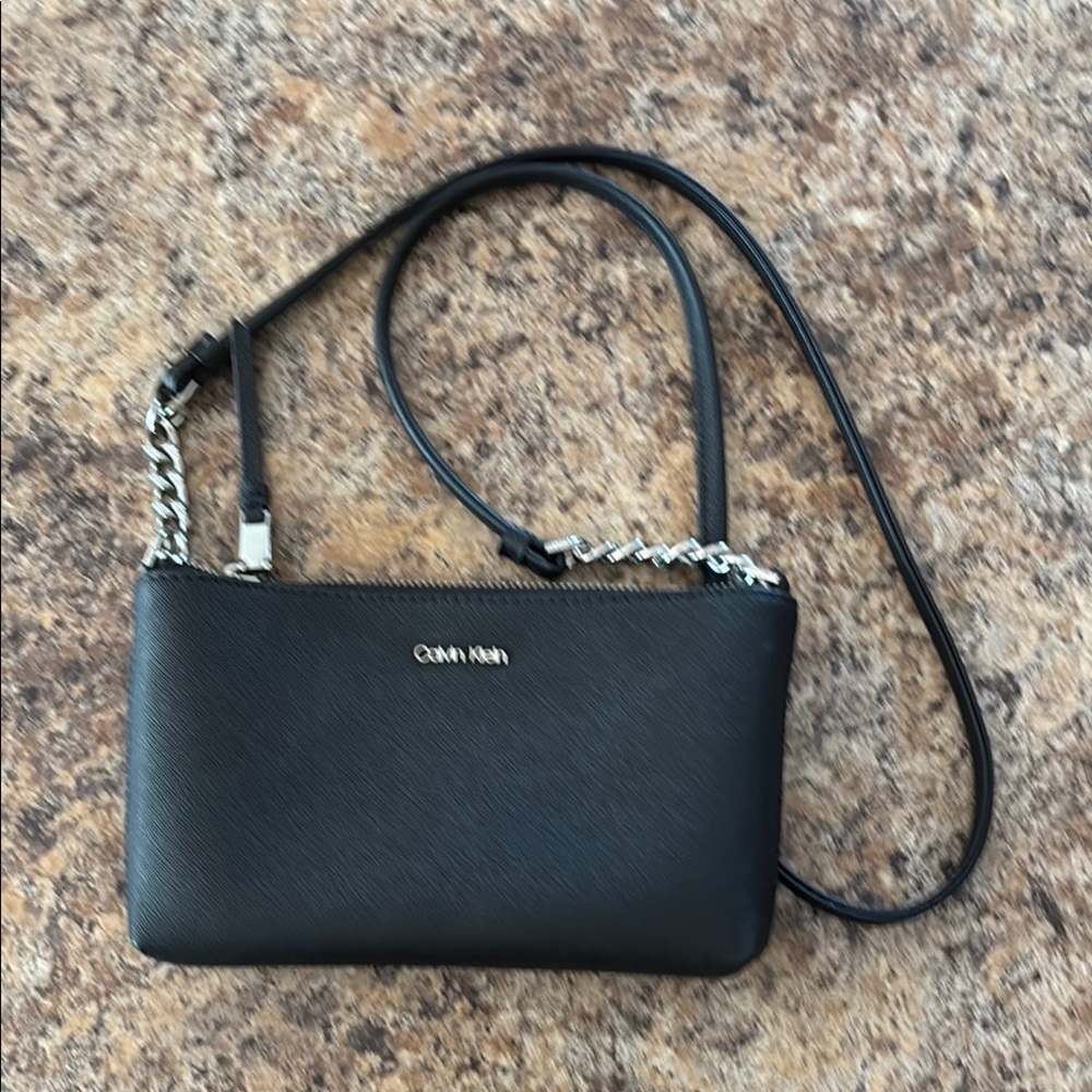 Calvin Klein Black Leather Crossbody Bag with Silver Accents